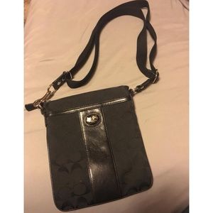 Black clash cross body bag